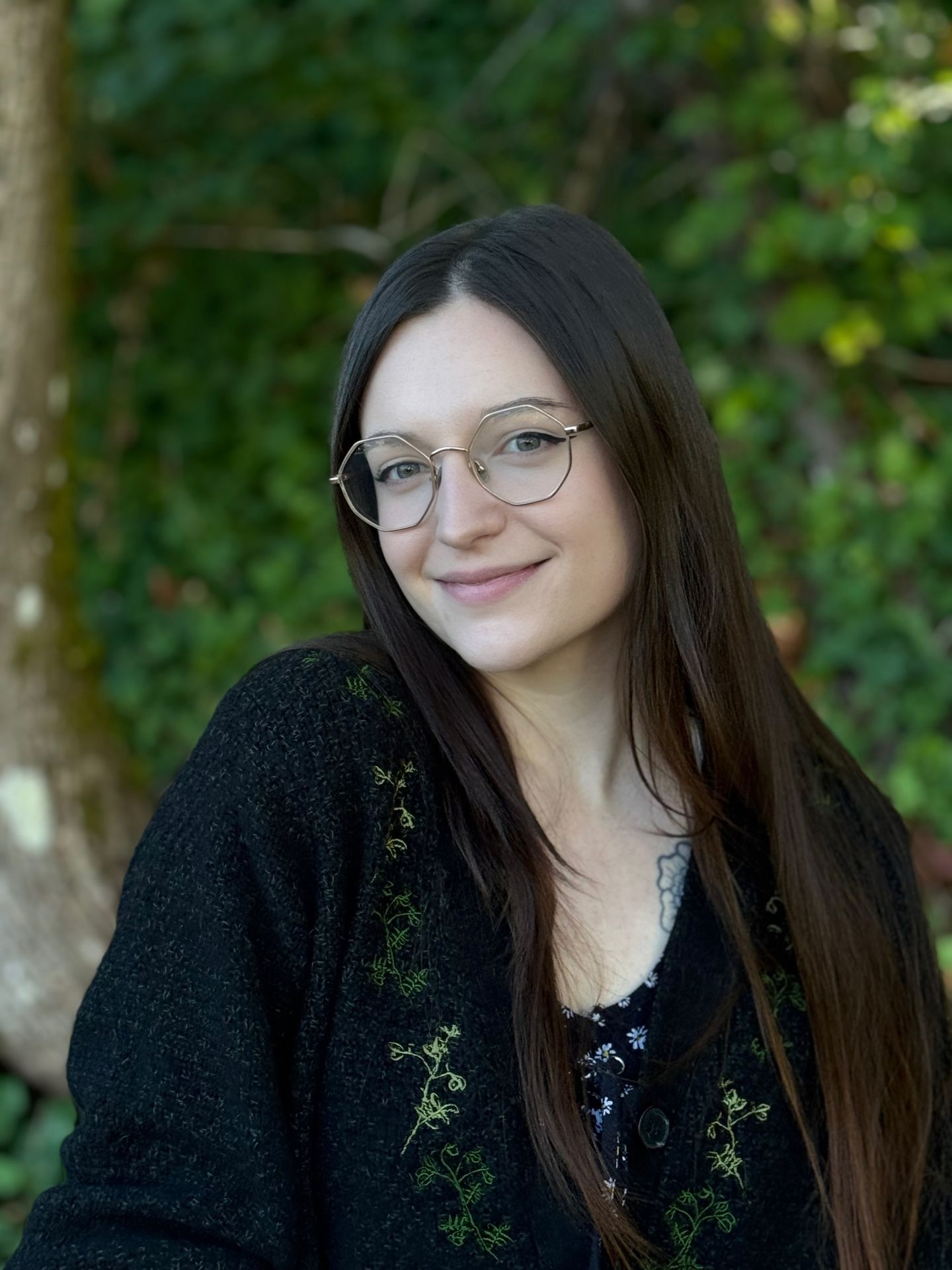 Emily Walker, LPC | (They/Them)