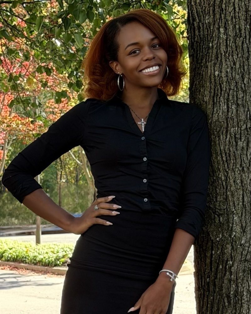 Quanaisha “Nay” Smith, M.A.