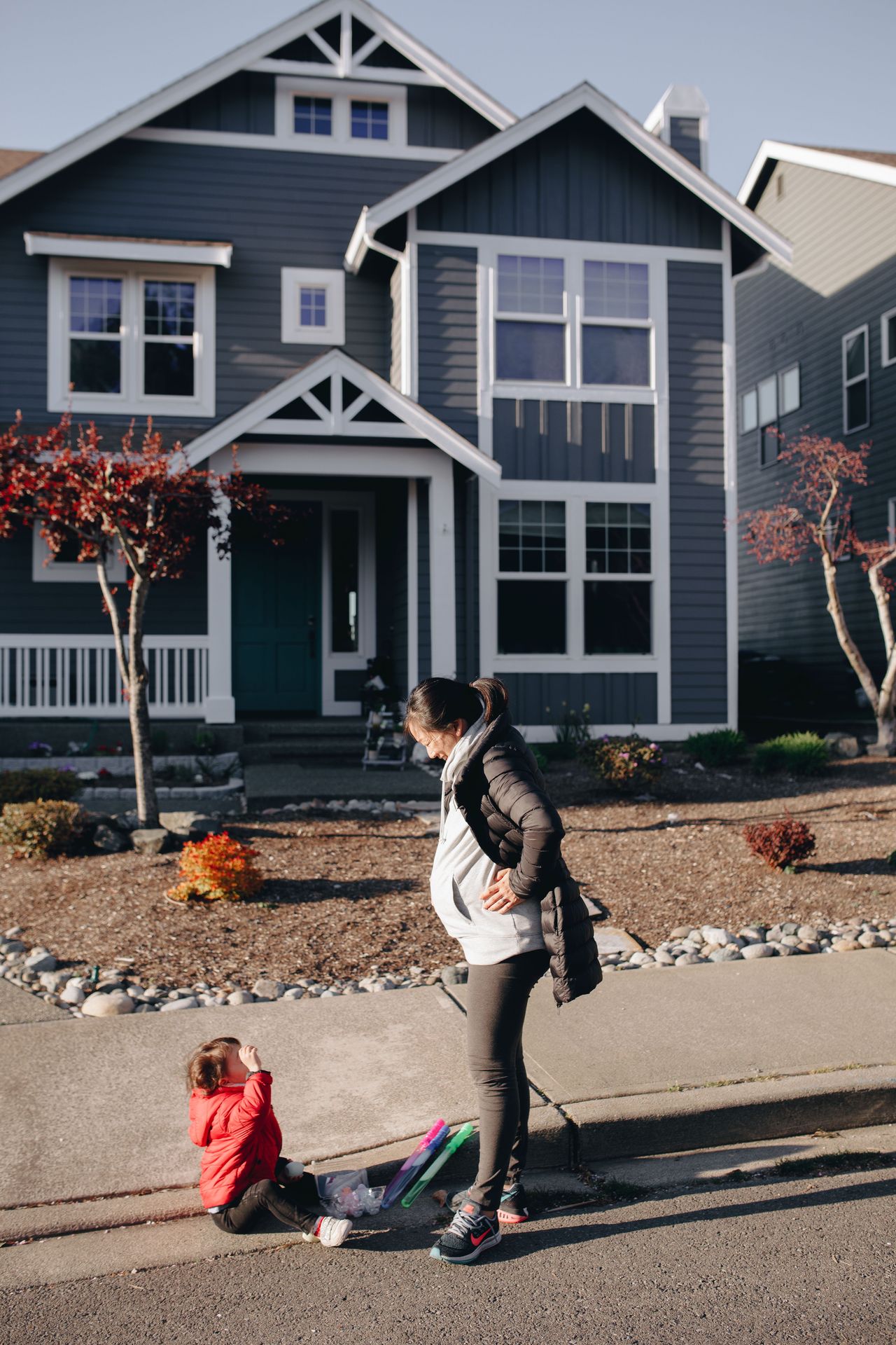 Mom staying calm as her child melts down outside their home