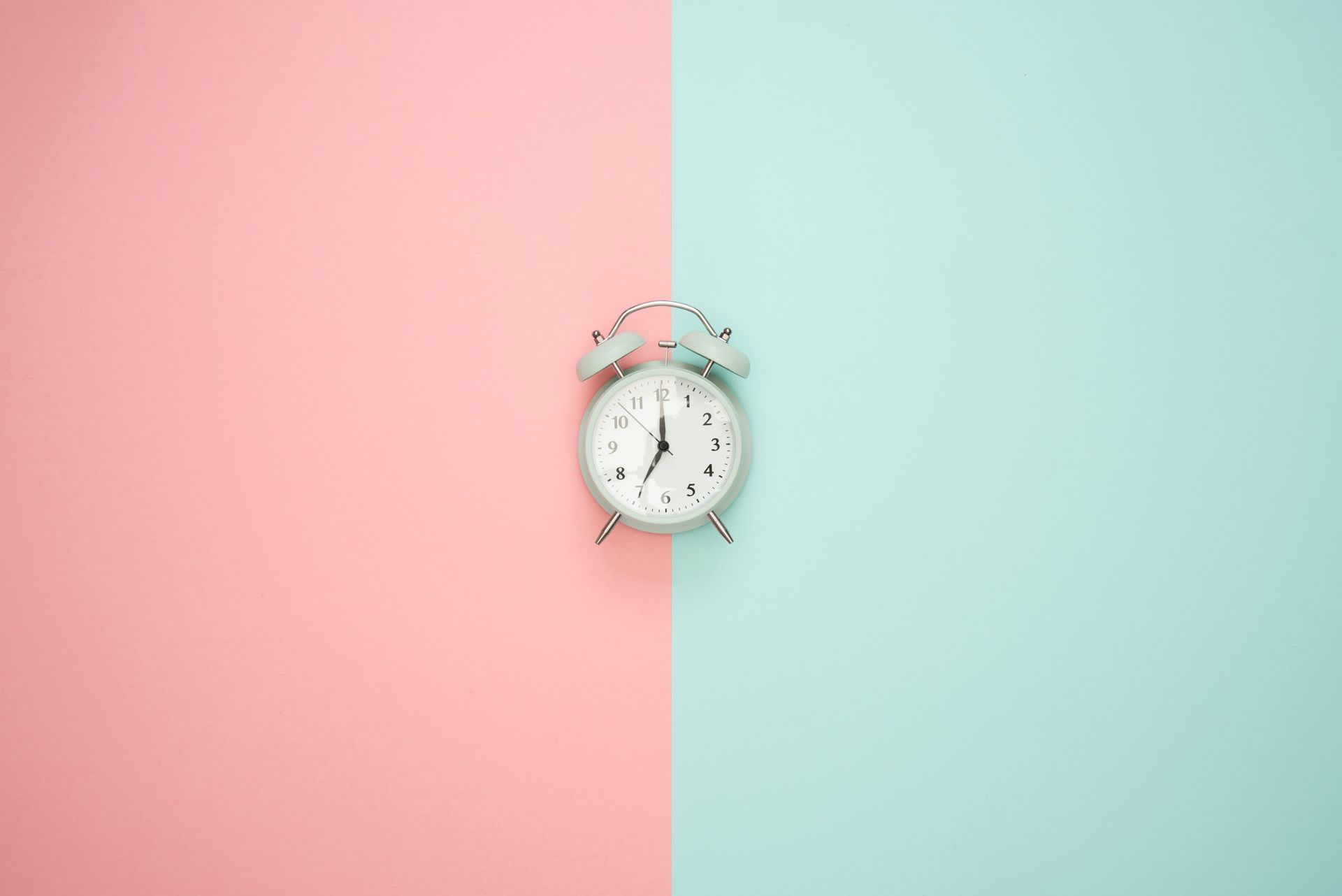 small clock background is half pink half blue
