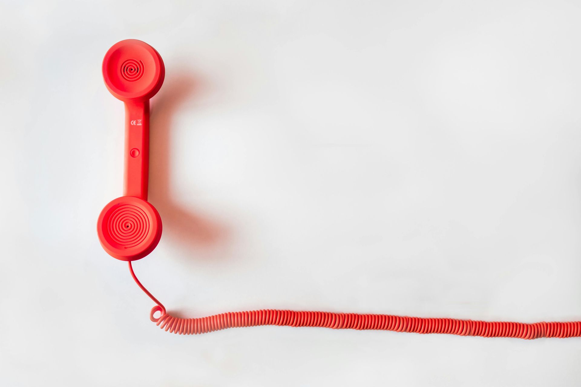 red phone and red line on a white background.