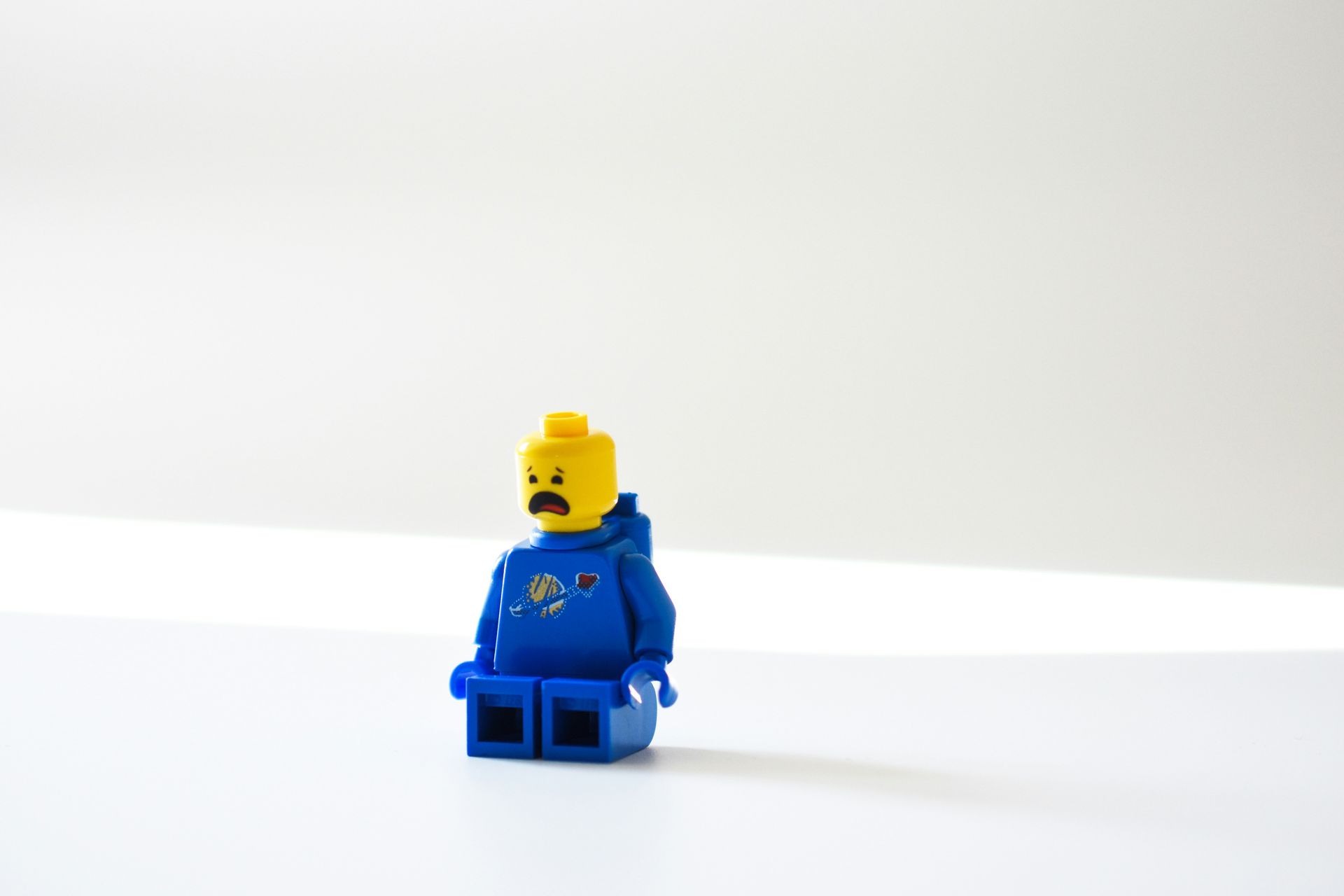 lego person with a sad facial expression. 45 regulation activities to boost well-being