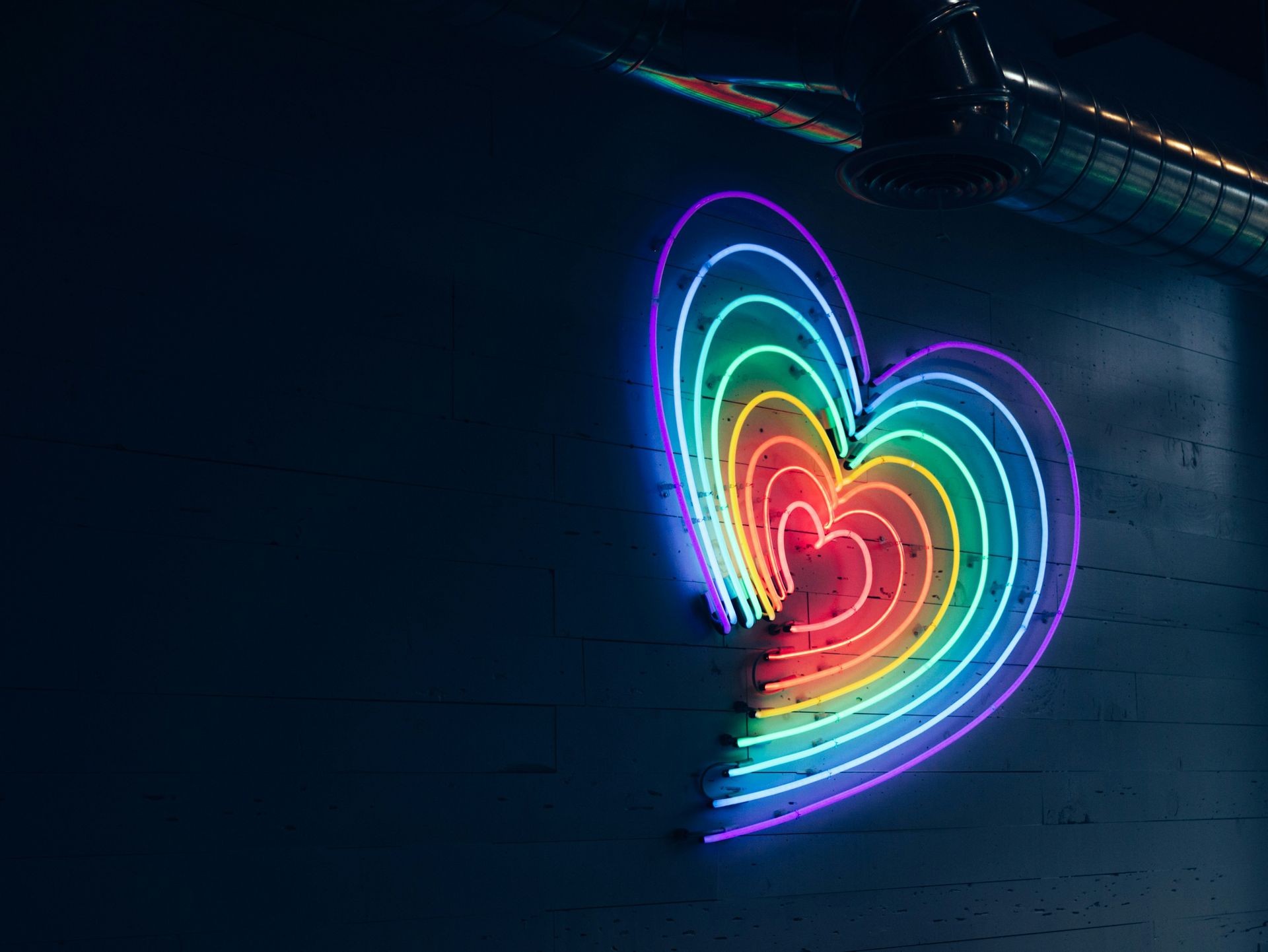rainbow striped neon light heart; online group counseling services anxiety women adult Alaska