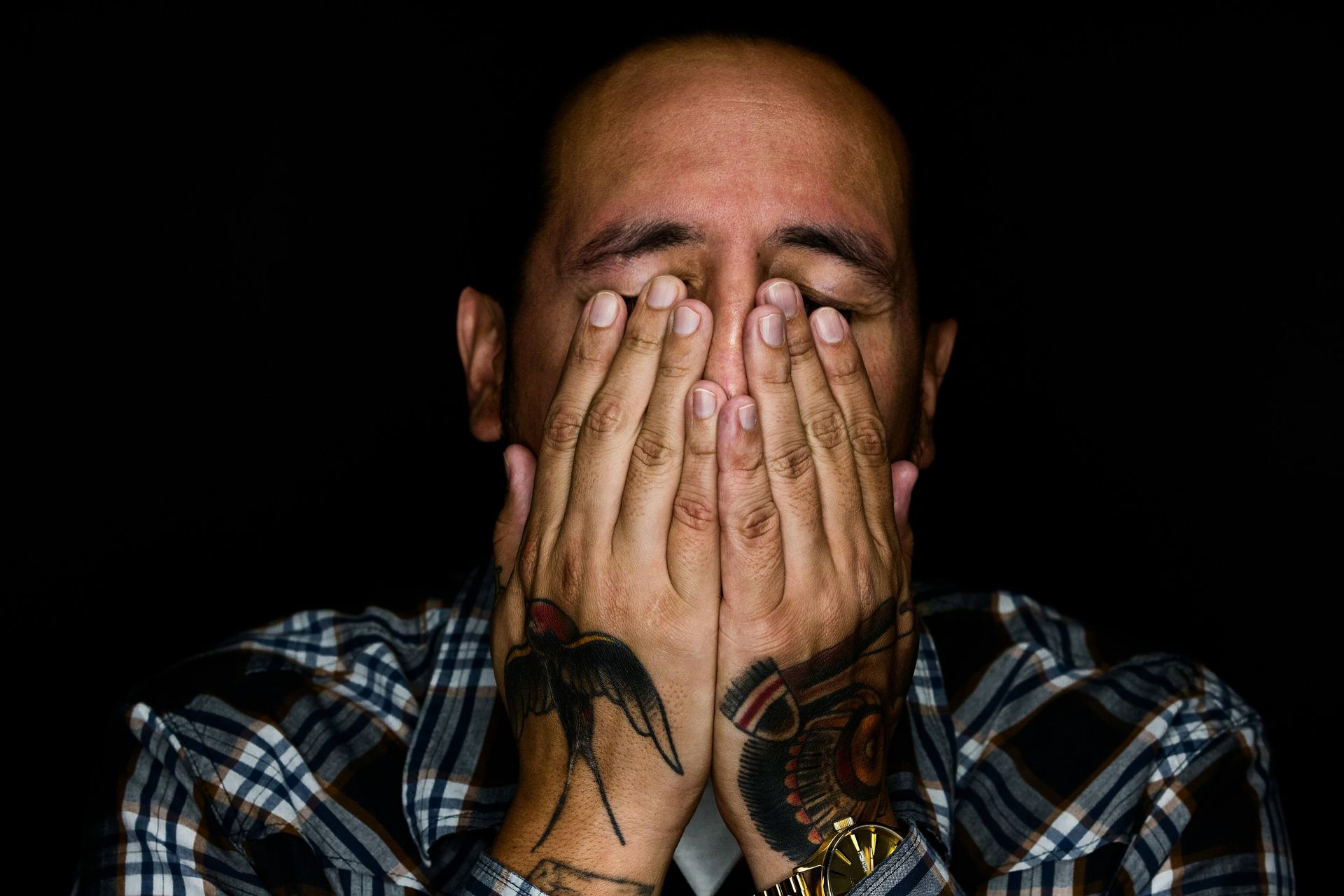 A man holding his face representing distress & grief. grief therapist in san francisco, ca | grief therapy in san francisco, ca | grief counseling san francisco, ca | 94122 | 94539 | 94110 