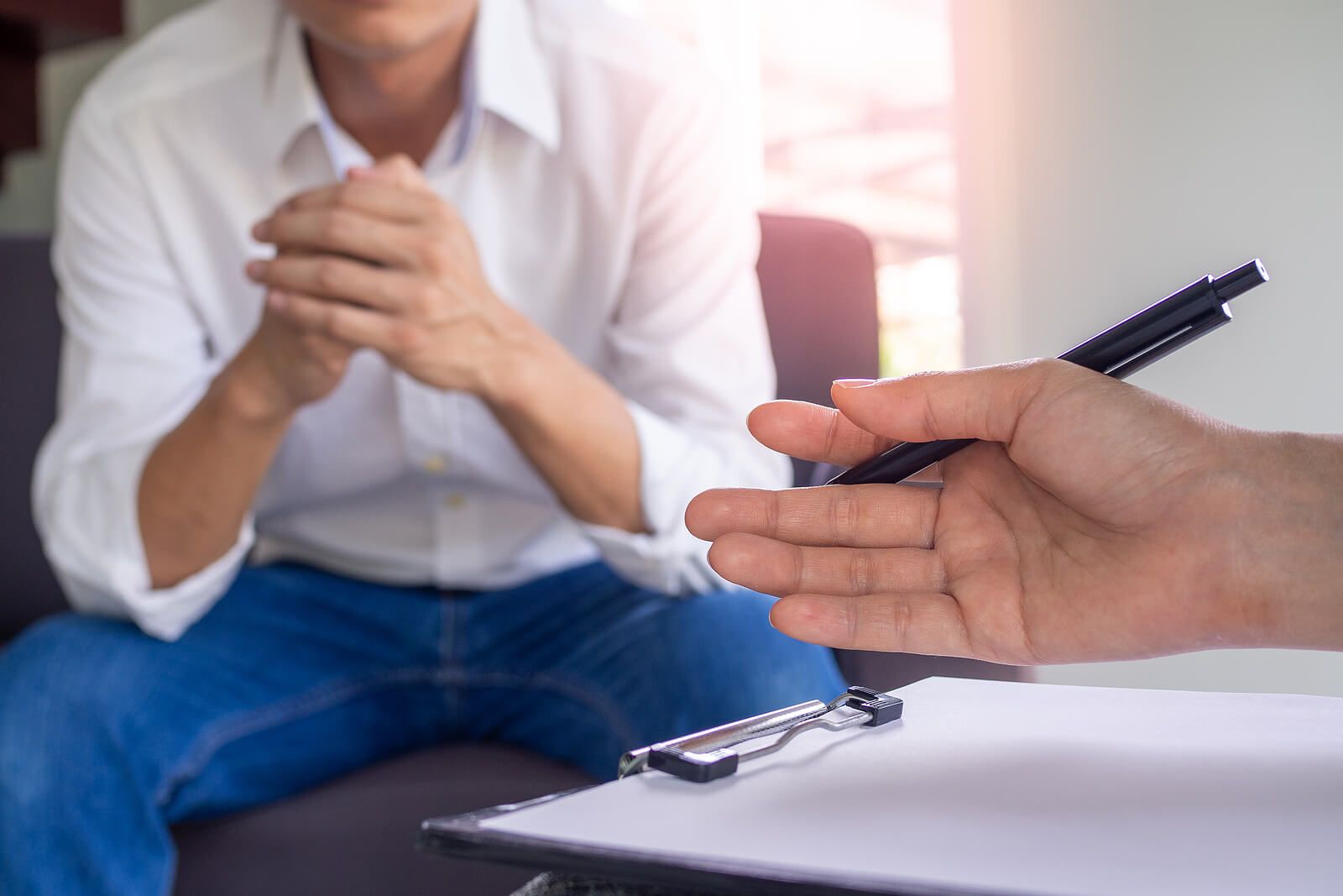 A man sitting while talking to a men's therapist | men's therapy san francisco, ca | men's counseling san francisco, ca | online men's issues counseling california | 94110 | 94112 | 94116