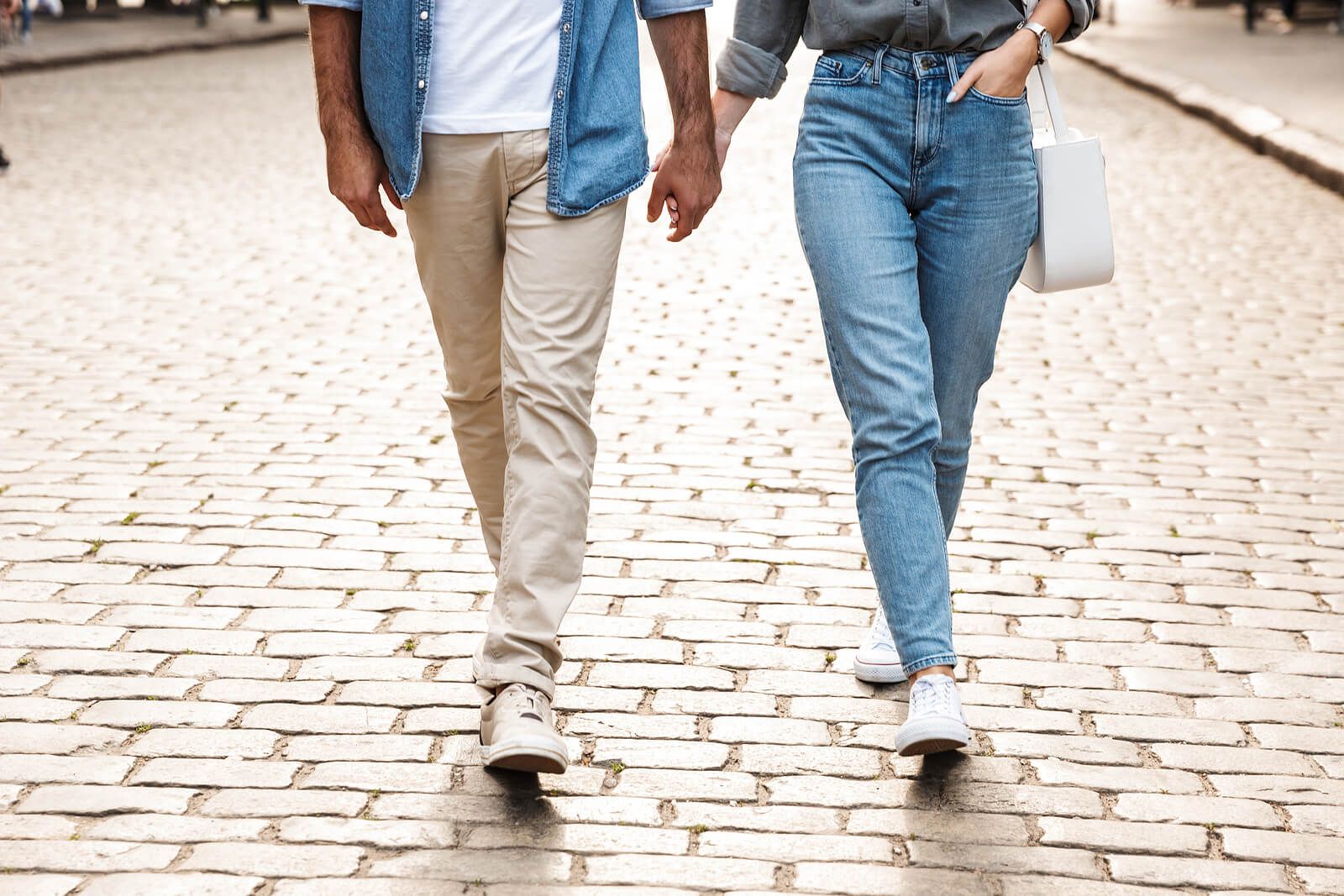 A couple holding hands & walking together | grief therapist in san francisco, ca | grief therapy in san francisco, ca | grief counseling san francisco, ca | 94110 | 94112 | 94116