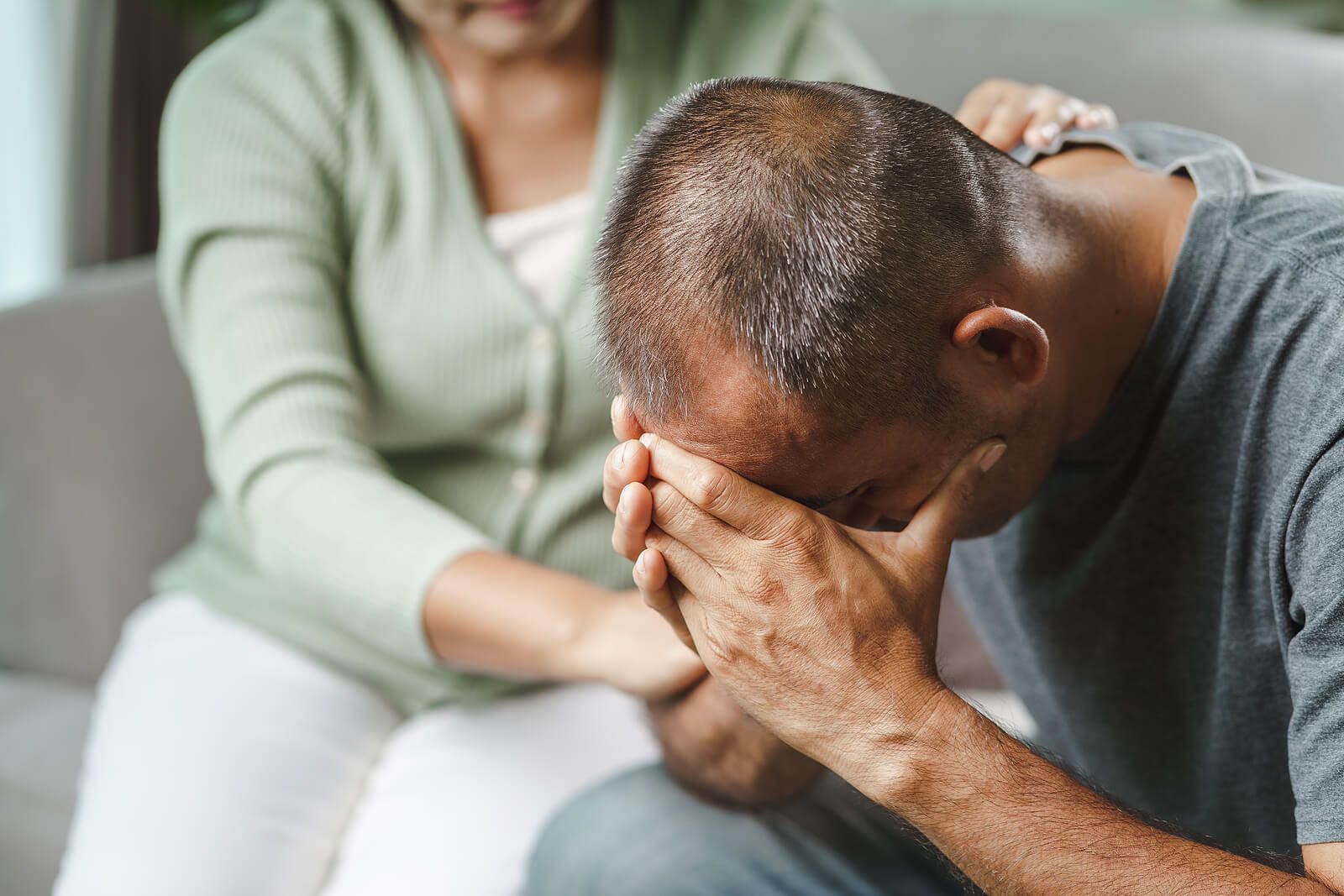An older man holding his head in his hands | grief therapy in san francisco, ca | grief therapist san Francisco, ca | grief counseling san francisco, ca | 94122 | 94539 | 94110