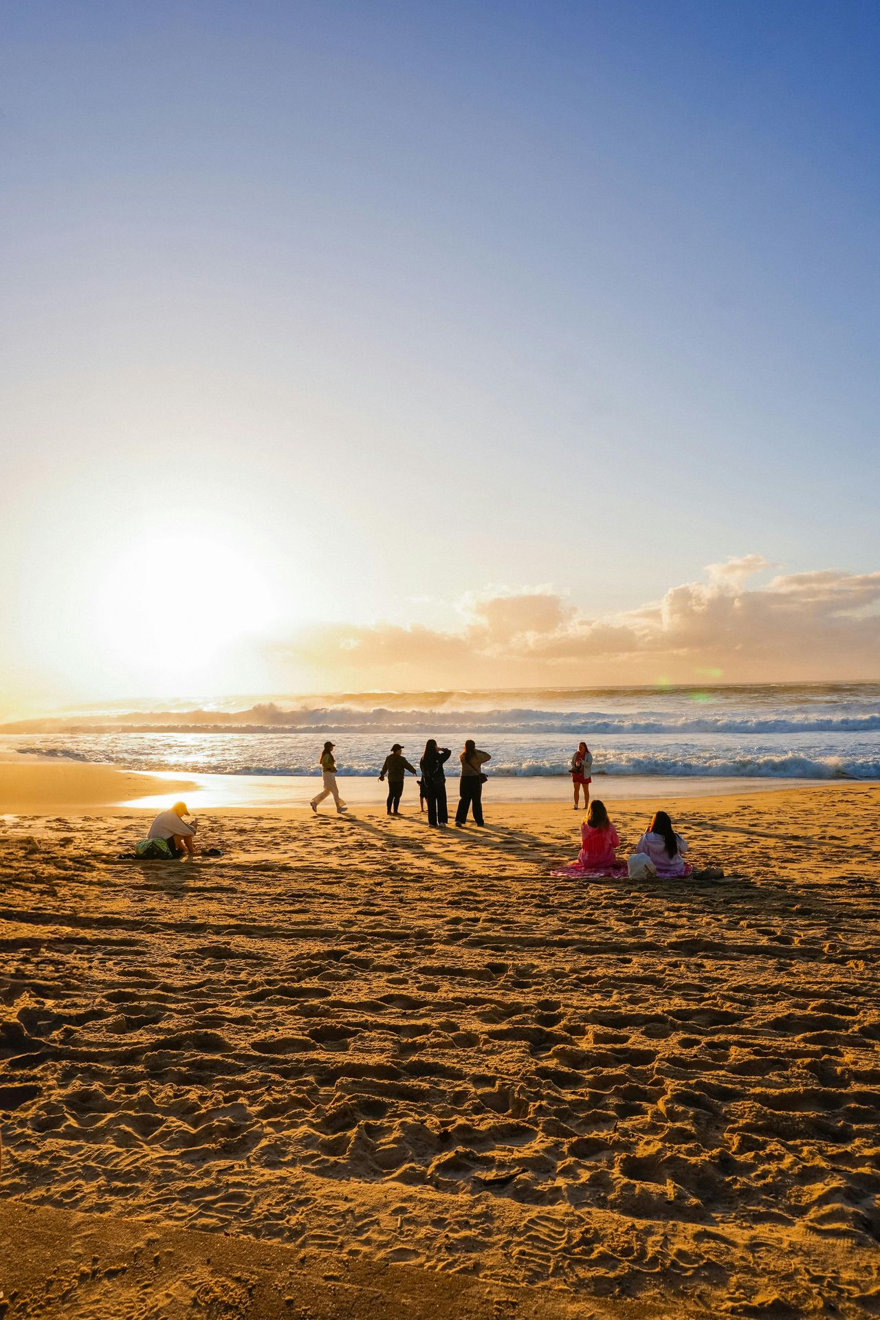 faraway picture of a family on the beach at sunset, uplift and connect counseling