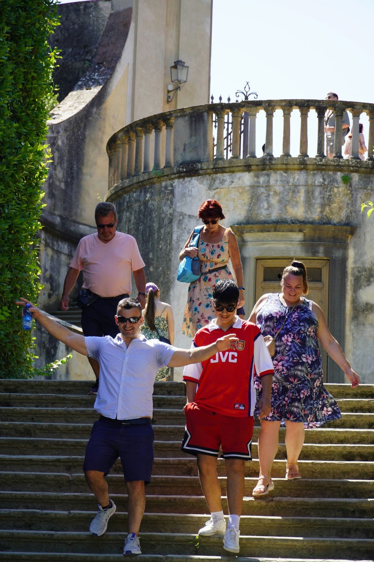 family of five walking down steps together