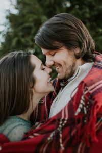 A couple looking at one another, hugging, and smiling. Represents the need for emotionally focused therapy for couples in Katy, TX 77494
