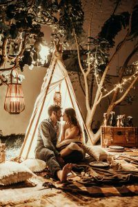 Couple sharing a kiss, Couple sharing a trusting moment at night, Couple leaning in close, intimacy, trust, how to build trust with your partner blog, relationship, begin counseling in Katy Texas, Fulshear Texas, Richmond Texas