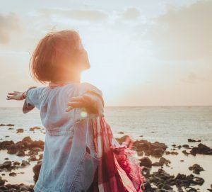 woman looking free and happy by the ocean, Positive and Negative Self-Talk blog, counseling center at cinco ranch, katy texas 77494