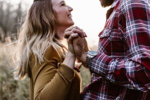 A couple holding hands and connecting after their couples counseling session in Katy, TX 77494