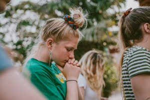 Young girl looking pensive, at school or in a school setting or function, Helping Middle School Kids Adjust blog, counseling center at cinco ranch, katy texas, fulshear, richmond texas, 77494