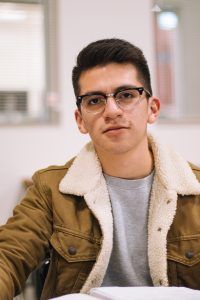 A teenage boy using his mental health toolkit the learned during family counseling in Katy, TX to help him cope with different issues he experiences.