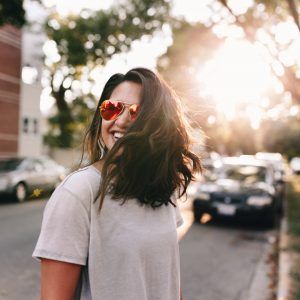 woman smiling on street