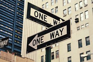 one way sign downtown, showing indecision or inability to make a decision after trauma, trust issues after trauma blog, counseling center at cinco ranch, 77494