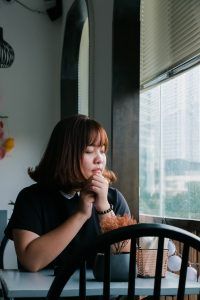 Woman sitting at table