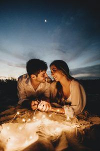 Couple sharing a trusting moment at night, Couple leaning in close, intimacy, trust, how to build trust with your partner blog, relationship, begin counseling in Katy Texas, Fulshear Texas, Richmond Texas