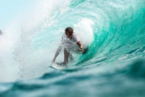 a man surfing, riding the wave, mindfullness meditation blog, reduce anxiety, counseling center at cinco ranch, katy texas