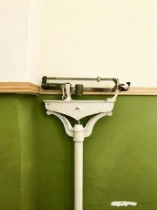 A scale that represents learning to new ways to think about diets and healthy bodyweight. Tips learned in body image group therapy in Katy, TX 77494