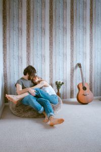 A man and woman married couple sitting together being intentional with one another after their counseling session in Katy, TX 77494