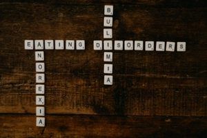 scrabble peieces that spell out eating anorexia bulemia disorders, misconceptions about eating disorders blog, counseling center at cinco ranch