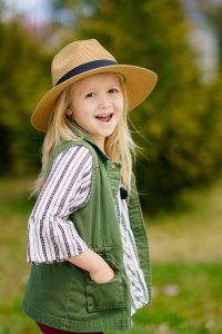 young girl laughing in a field, therapy, counseling center at cinco ranch, 77494