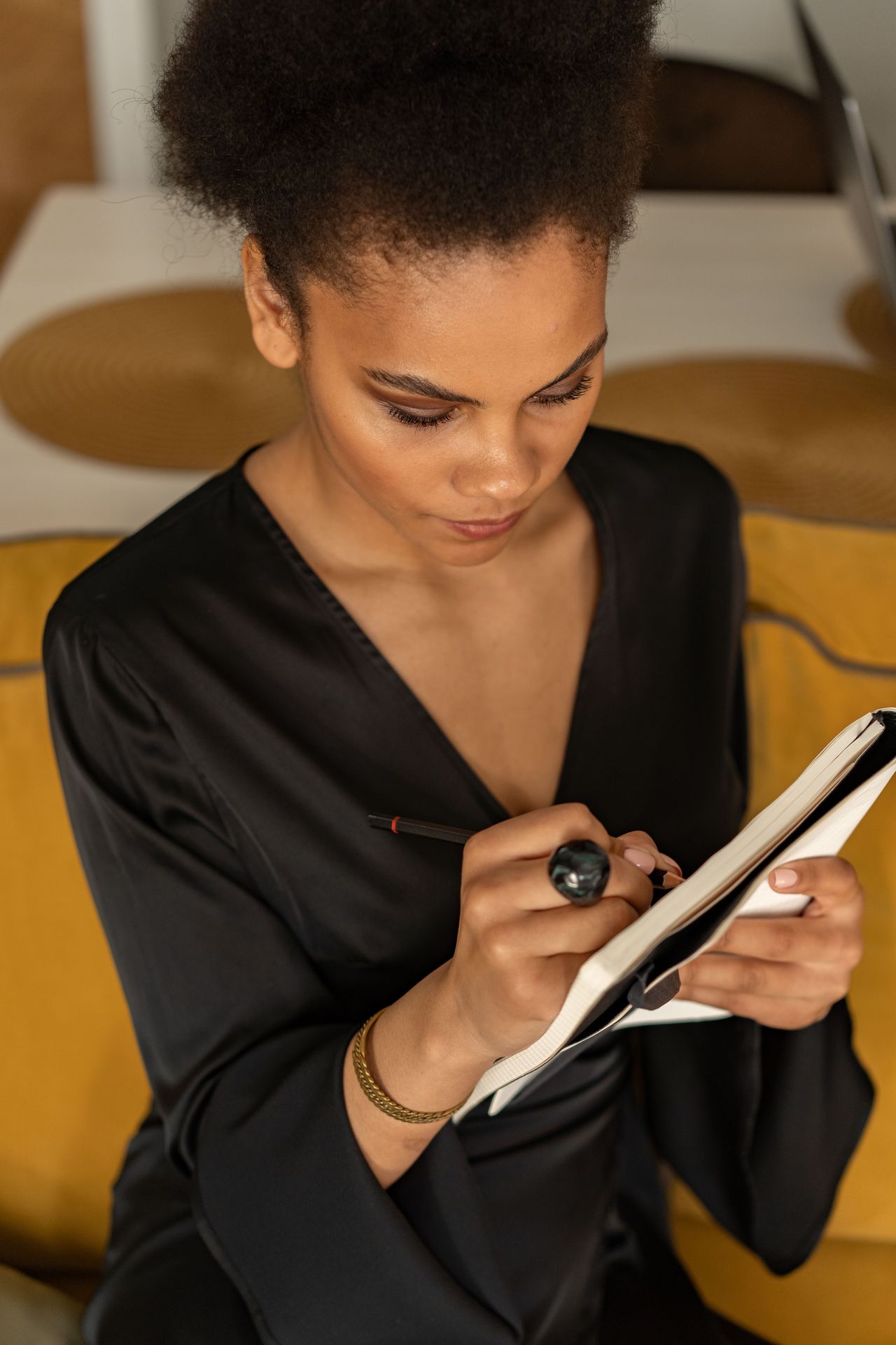 A woman taking time to write in her journal