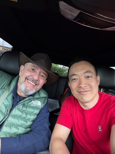 A therapist and colleague share a warm moment during a car ride at an advanced EMDR training event hosted in Delray Beach, FL. Bringing world-class education to local clinicians strengthens the quality of EMDR therapy in Palm Beach County, FL for clients seeking specialized trauma care.