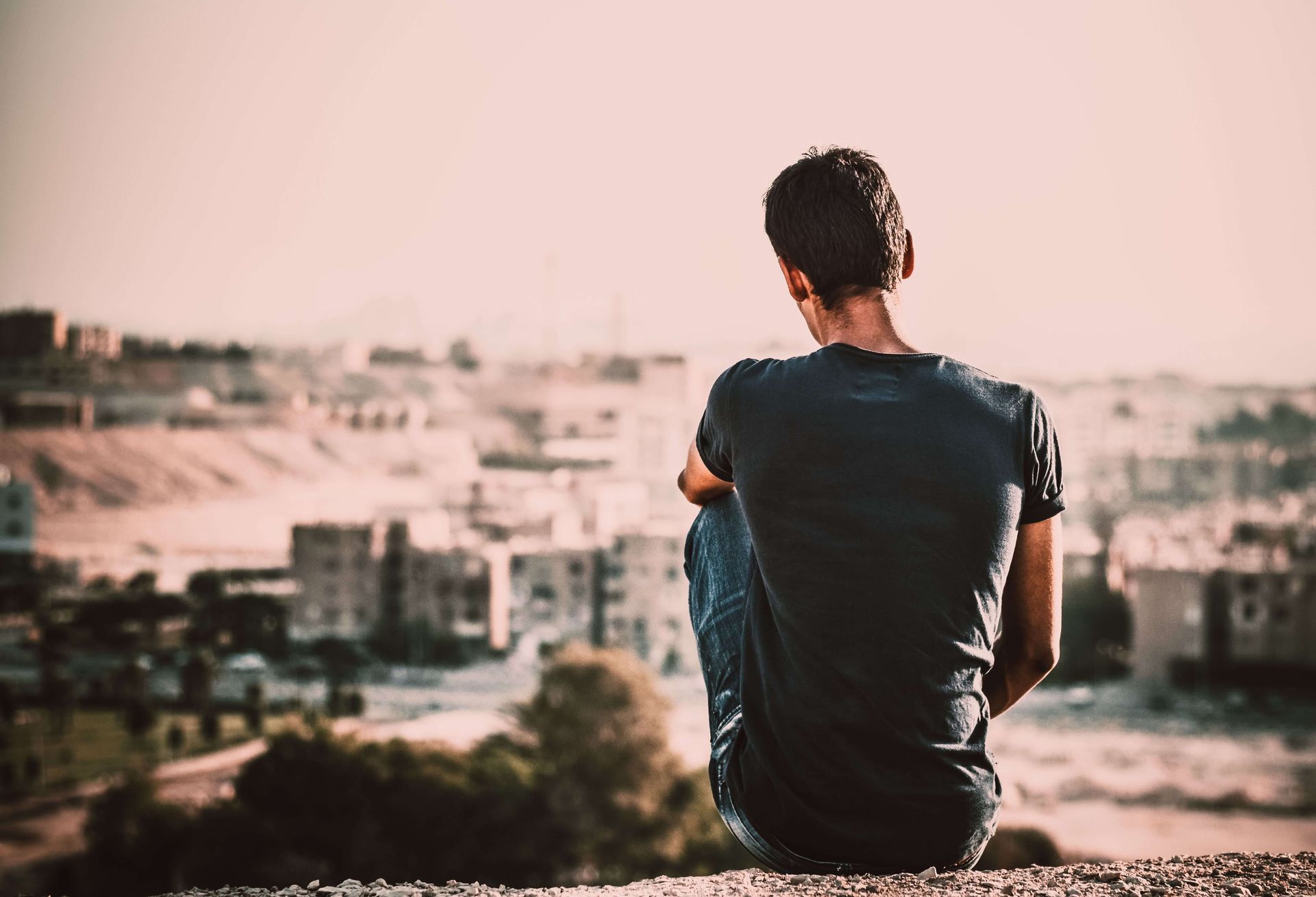A man sits alone on a hillside looking out over a city, reflecting the isolation and internal weight that often accompanies high-functioning addiction. For many high-achieving individuals, addiction therapy near Boca Raton, FL offers a private, supportive space to explore these feelings without disrupting the structure of daily life. An addiction therapist in Palm Beach County, FL can help you address the deeper emotional roots that substance use has been covering up.