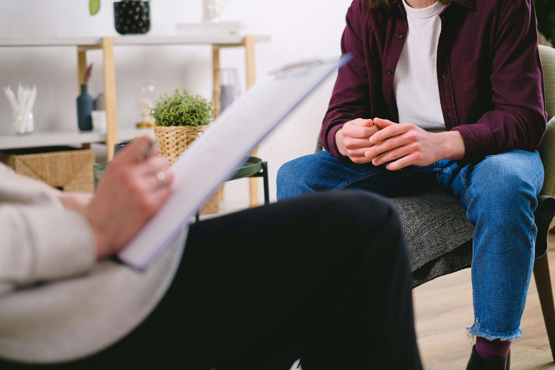 Close-up of a counseling session: a client speaks while a clinician takes notes. Working with an emdr therapist in palm beach county, fl supports recovery through emdr therapy in palm beach county, fl as part of comprehensive trauma treatment in palm beach county, fl.