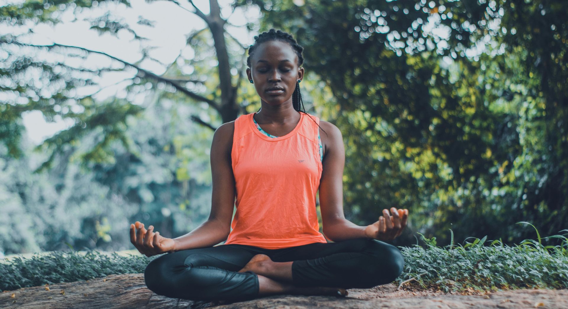 A woman sits on the soil while meditating outdoors to promote healing through EMDR therapy in Palm Beach, FL and to support emotional regulation with EMDR in Palm Beach County, FL. Learn more about EMDR therapy in Palm Beach County, FL and the benefits of EMDR therapy in Palm Beach, FL. 33435 | 33426 | 33487