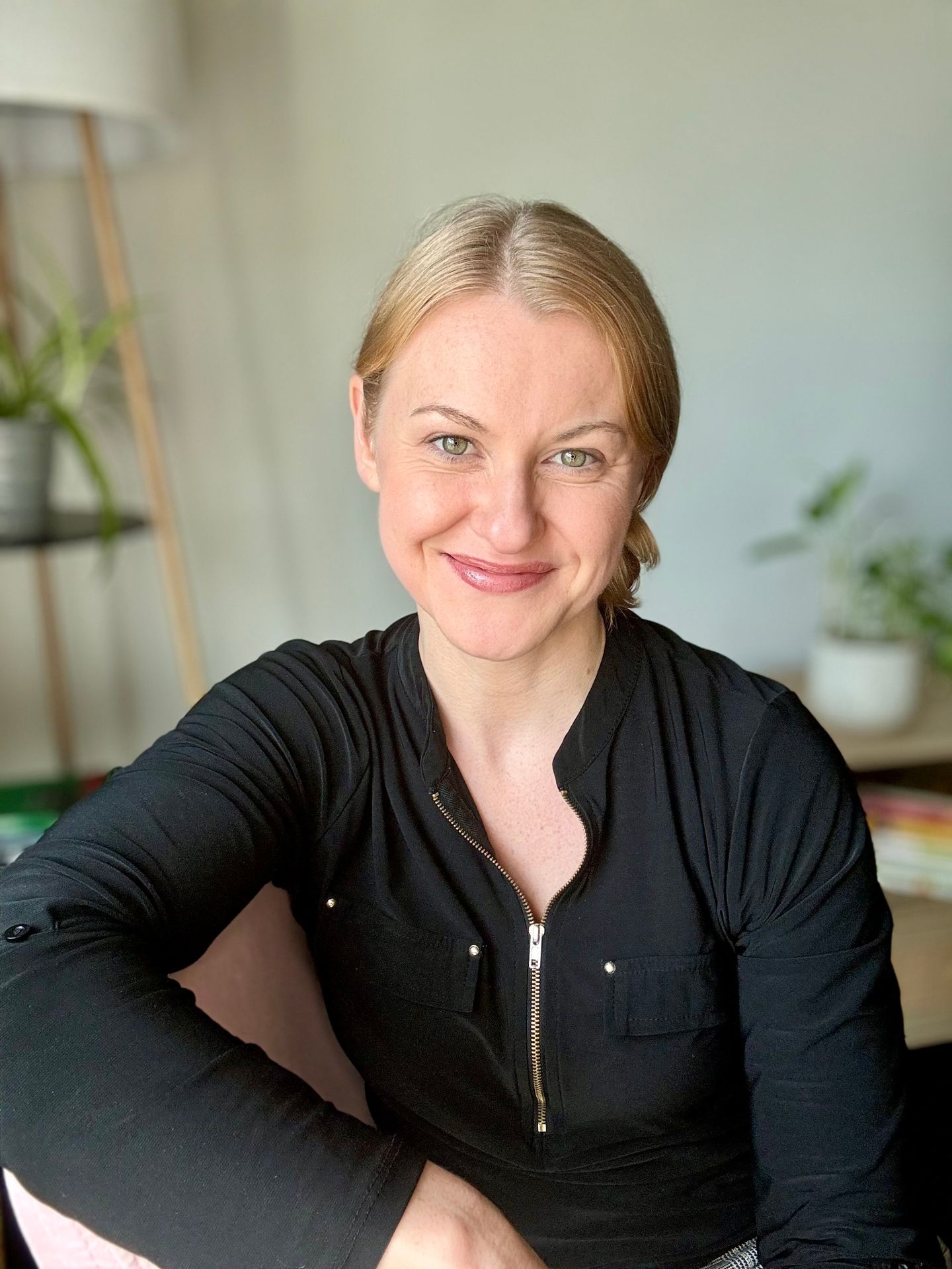 Therapist Morgan Davies smiles in a headshot.