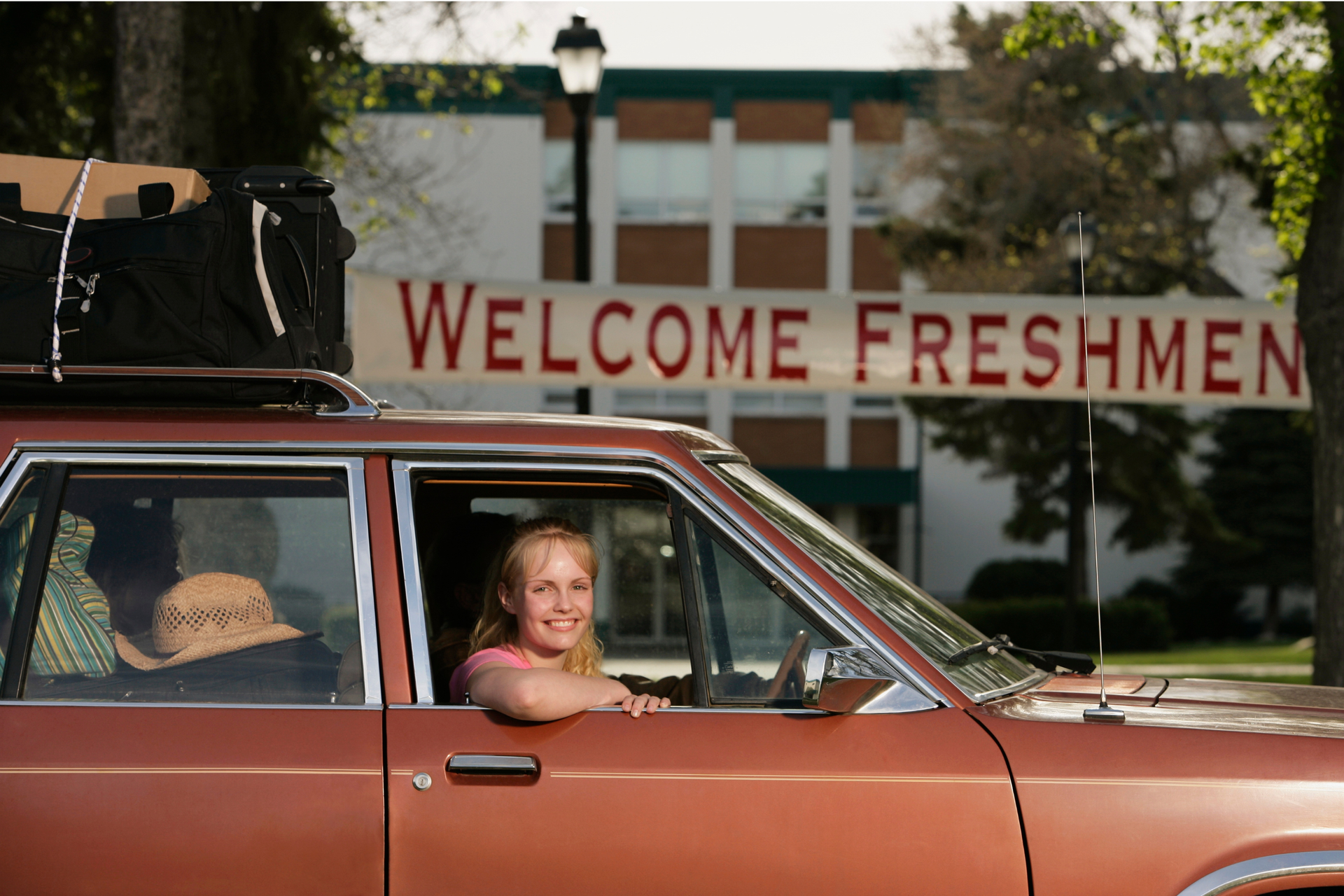 Adult college freshman in packed car