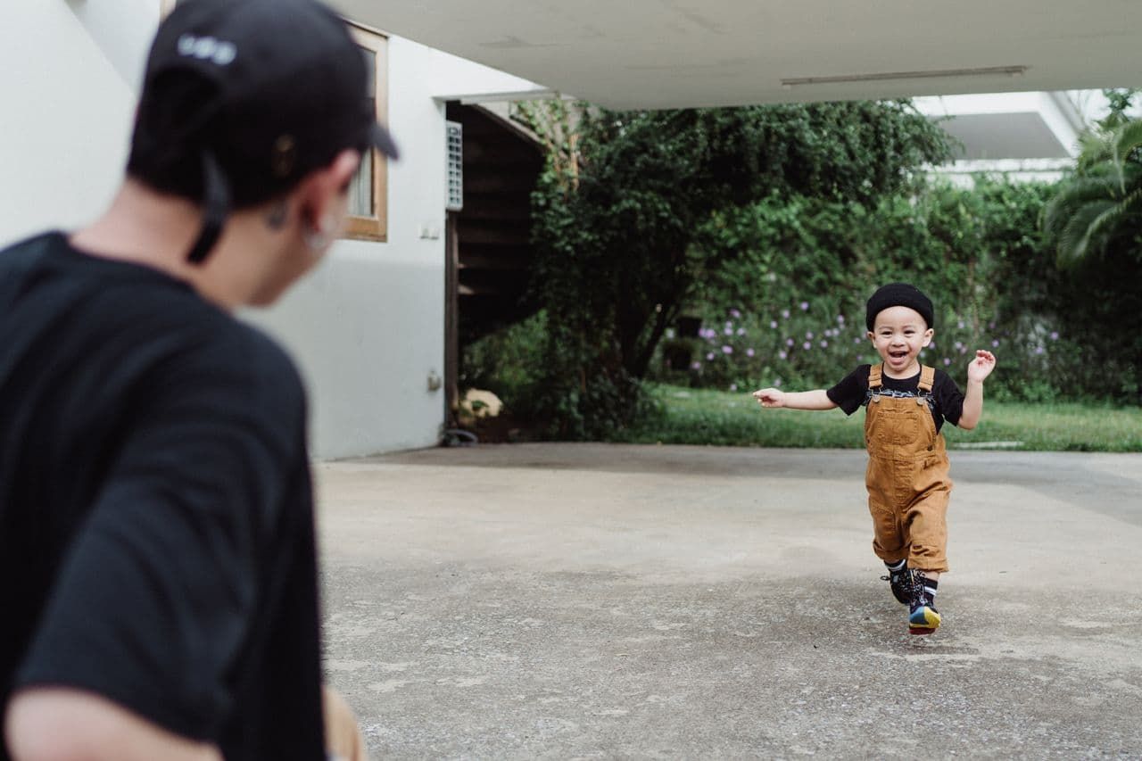 a-boy-running-to-his-father