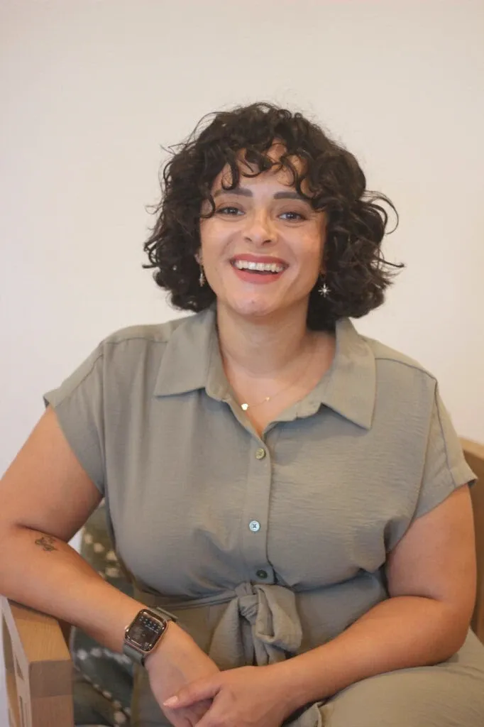A professional Latina Smiling 